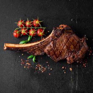 Tomahawk madurado de ternera  retinta de producción...